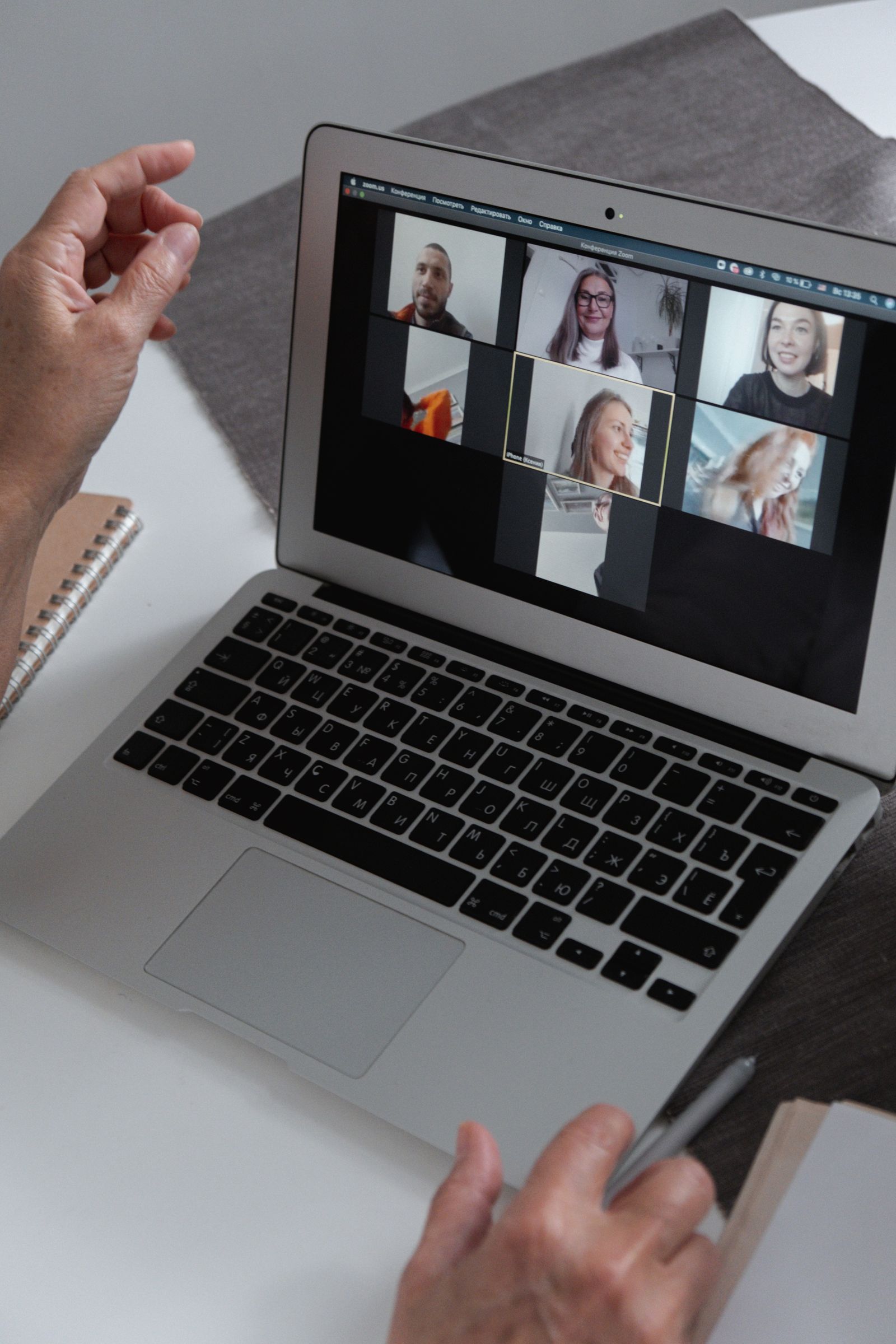 A video call on a laptop in a home office