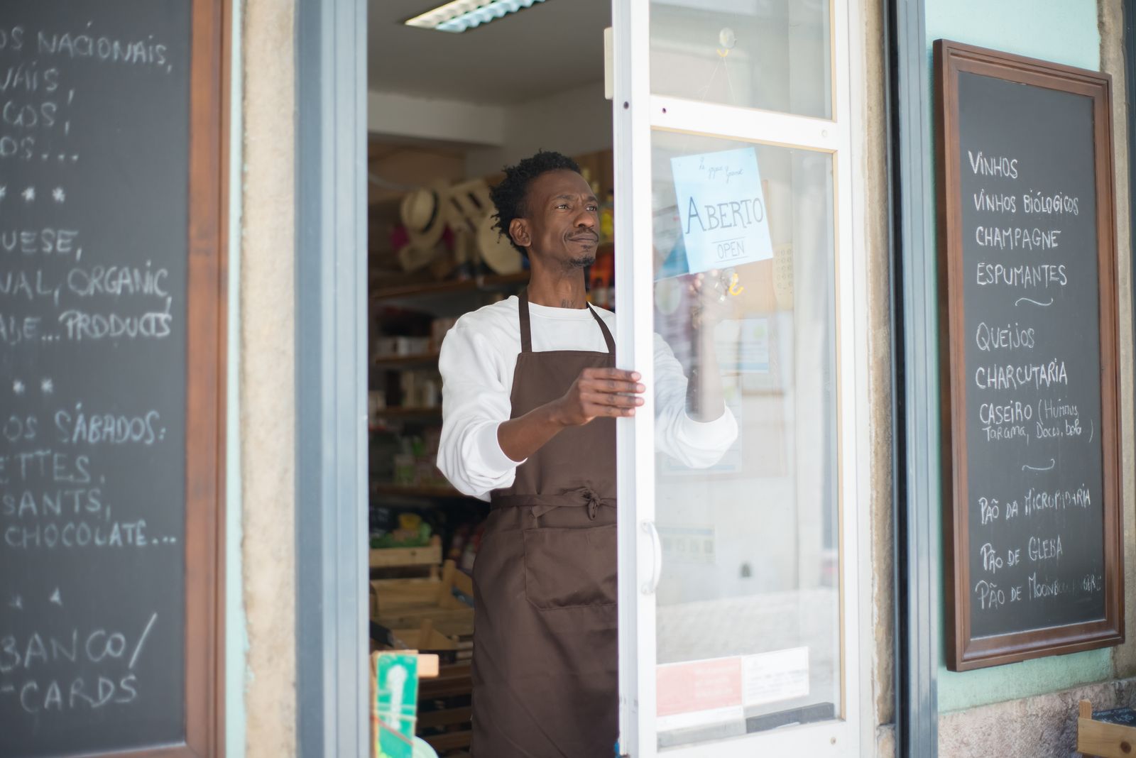 Small business owner at their storefront